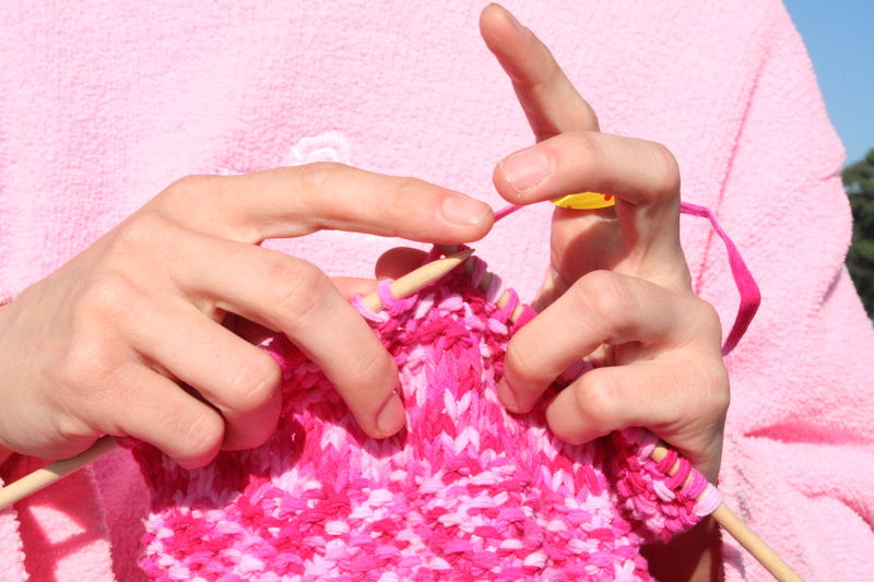 File:Pink knitting in front of pink sweatshirt.JPG