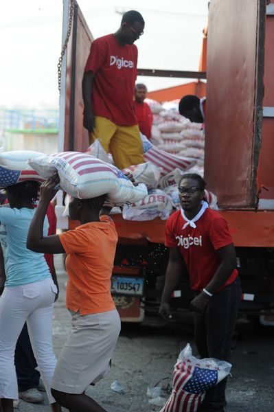 File:Digicel volunteers deliver aid in Port-au-Prince 2010-02-03.JPG